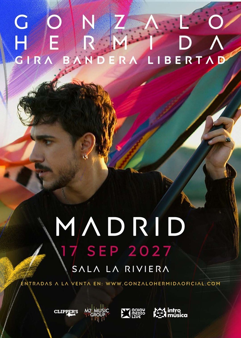 Concert poster for Gonzalo Hermida in Madrid on Sep 17, 2027 at Sala La Riviera; man holding a flagpole with colorful ribbons.