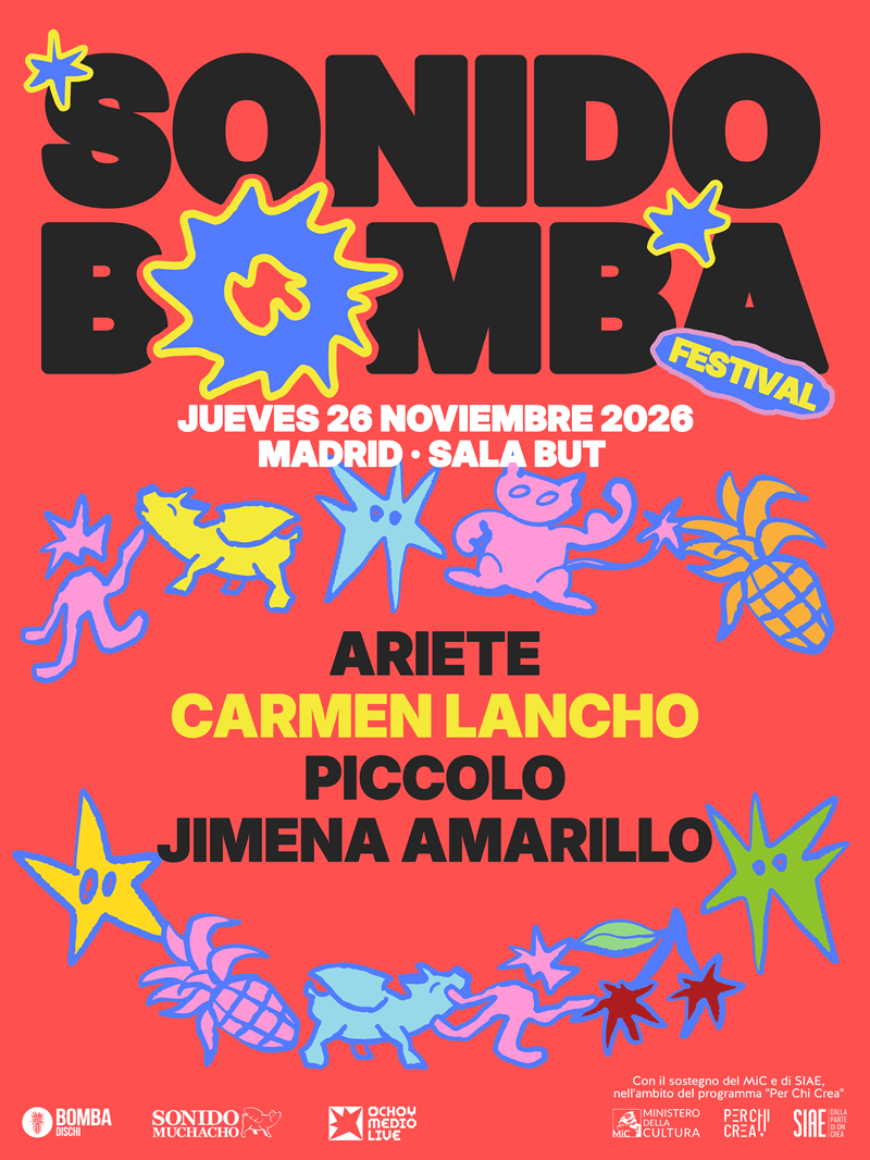 Red festival poster for Sonido Bomba Festival with large black title, Madrid 26 November 2026, bold lineup Ariete, Carmen Lancho, Piccolo, Jimena Amarillo, and playful colorful star and creature illustrations.