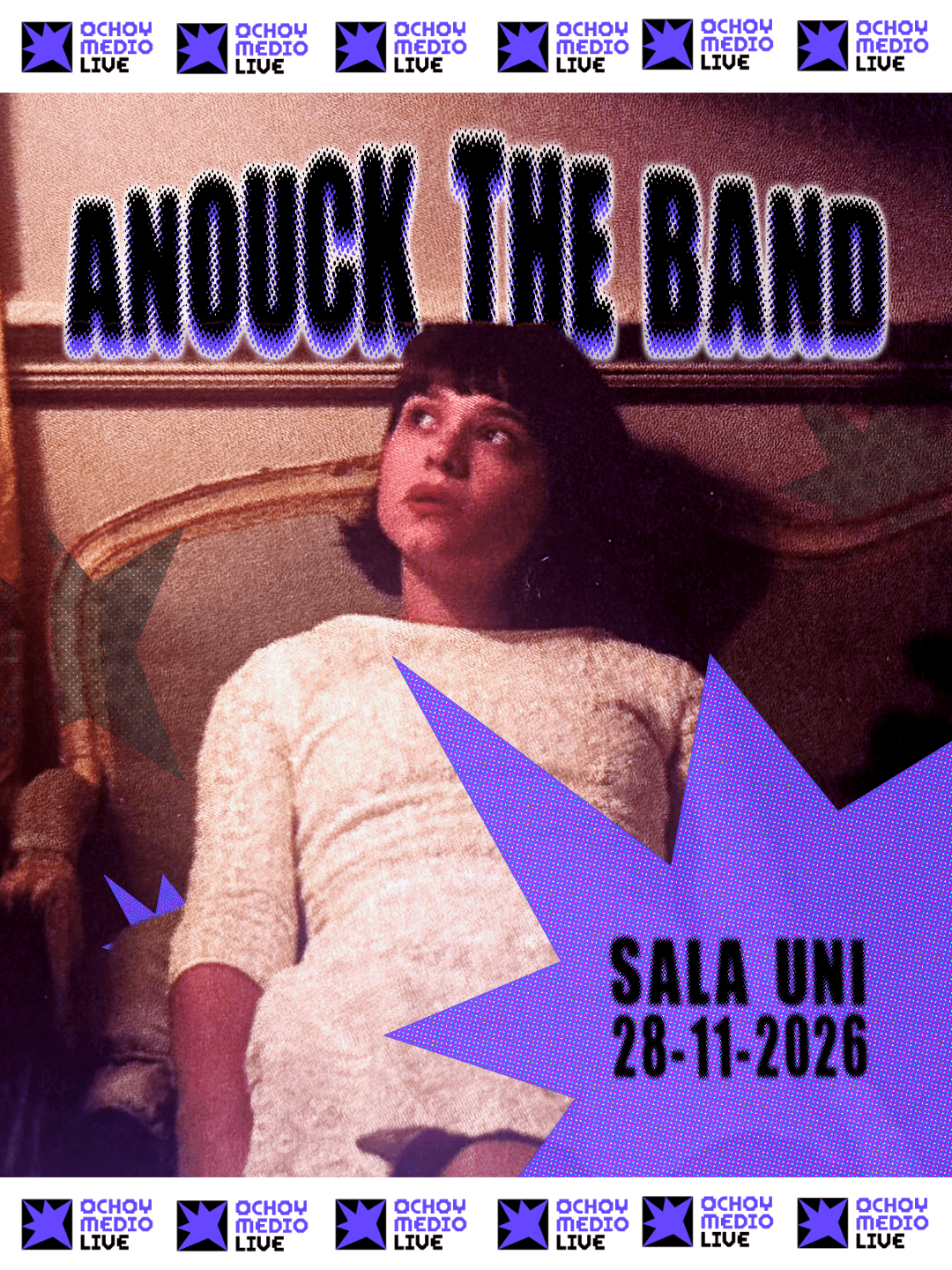 Poster for ANNOCK THE BAND gig at Sala UNI on 28-11-2026, featuring a woman lying in bed with purple geometric shapes.